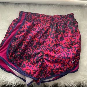 Pink/navy/black/red Nike track shorts